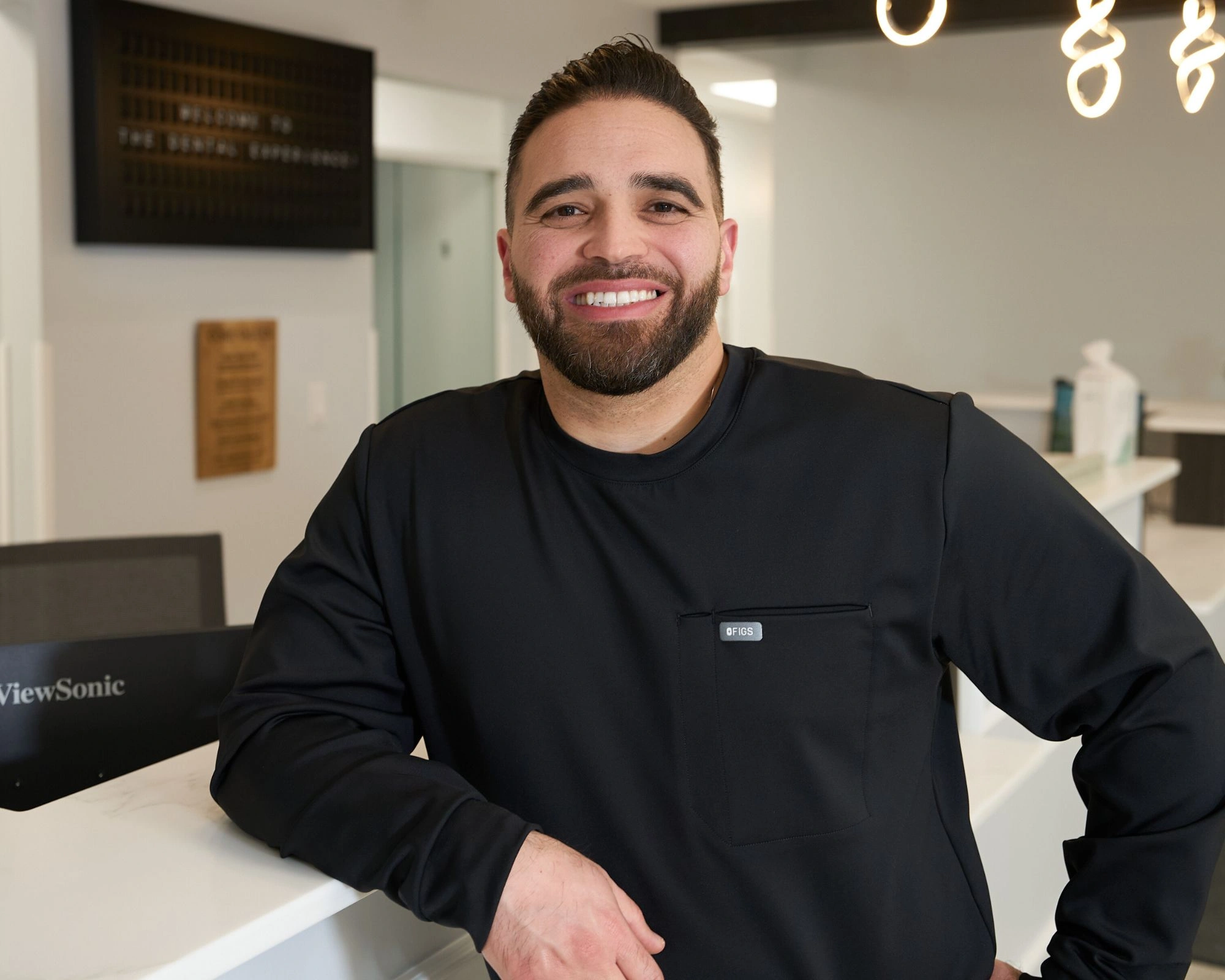 Jackson MI Dentist Firas Belbeisi DDS